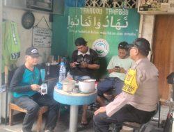 Cooling System di Tengah Warga: Bhabinkamtibmas Sampaikan Pesan Damai dan Waspada Kamtibmas